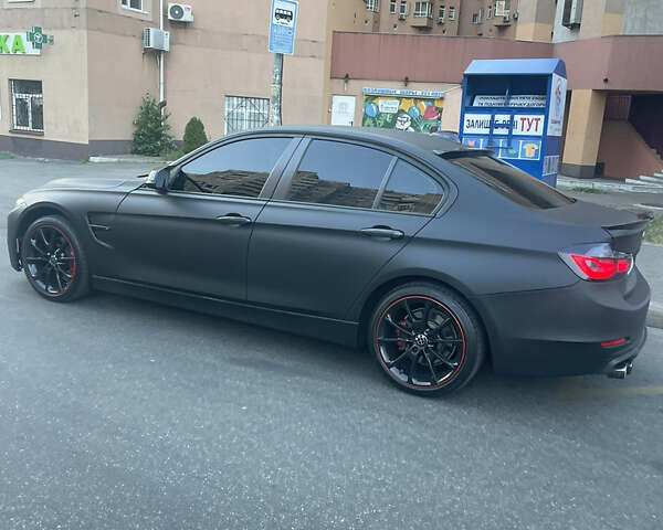 Чорний БМВ 3 Серія, об'ємом двигуна 2 л та пробігом 145 тис. км за 21500 $, фото 1 на Automoto.ua