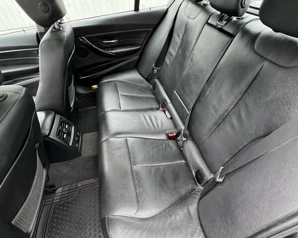 Черный БМВ 3 Серия, объемом двигателя 2 л и пробегом 236 тыс. км за 10999 $, фото 24 на Automoto.ua