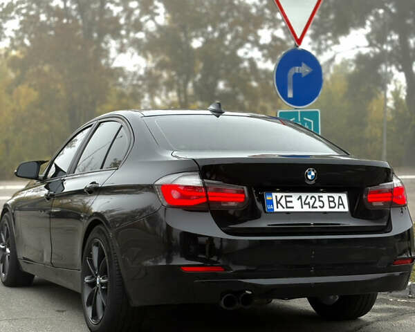 Черный БМВ 3 Серия, объемом двигателя 2 л и пробегом 193 тыс. км за 12500 $, фото 3 на Automoto.ua