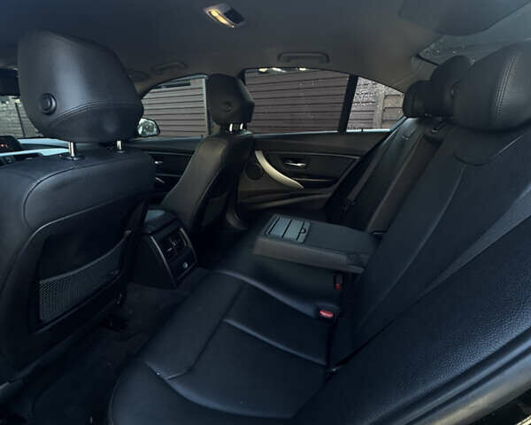 Черный БМВ 3 Серия, объемом двигателя 2 л и пробегом 240 тыс. км за 9799 $, фото 7 на Automoto.ua