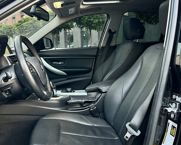 Чорний БМВ 3 Серія, об'ємом двигуна 2 л та пробігом 185 тис. км за 11700 $, фото 29 на Automoto.ua