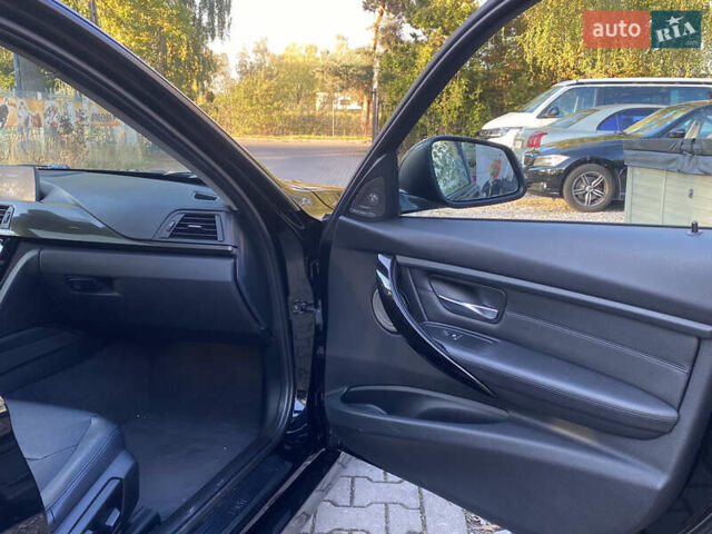 Чорний БМВ 3 Серія, об'ємом двигуна 2 л та пробігом 155 тис. км за 12999 $, фото 26 на Automoto.ua