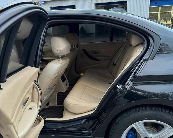 Черный БМВ 3 Серия, объемом двигателя 2 л и пробегом 165 тыс. км за 11800 $, фото 6 на Automoto.ua