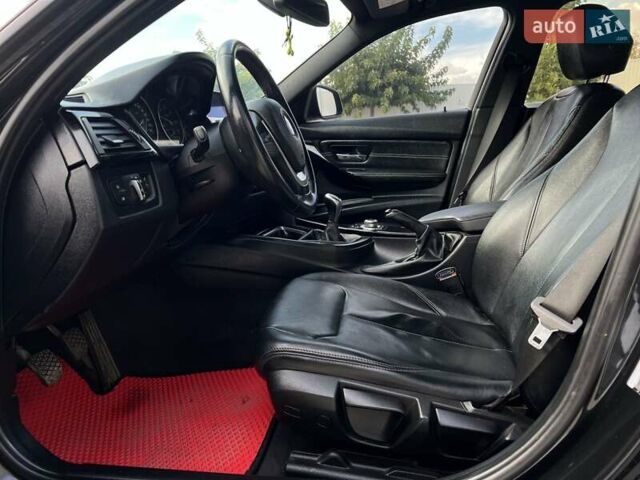 Чорний БМВ 3 Серія, об'ємом двигуна 2 л та пробігом 206 тис. км за 12600 $, фото 14 на Automoto.ua