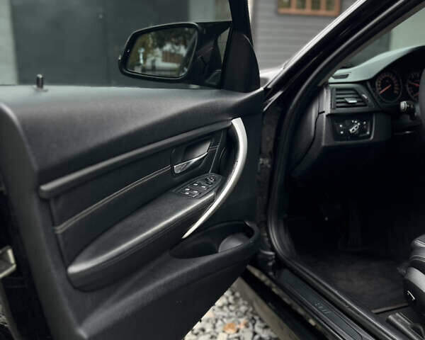 Черный БМВ 3 Серия, объемом двигателя 2 л и пробегом 297 тыс. км за 13600 $, фото 7 на Automoto.ua