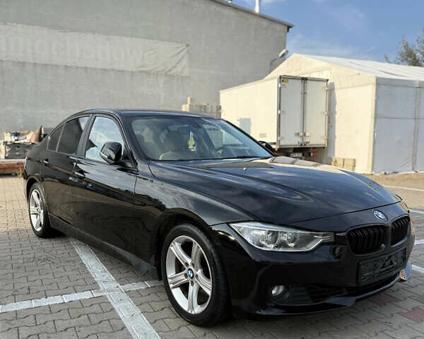 Черный БМВ 3 Серия, объемом двигателя 2 л и пробегом 143 тыс. км за 13855 $, фото 1 на Automoto.ua