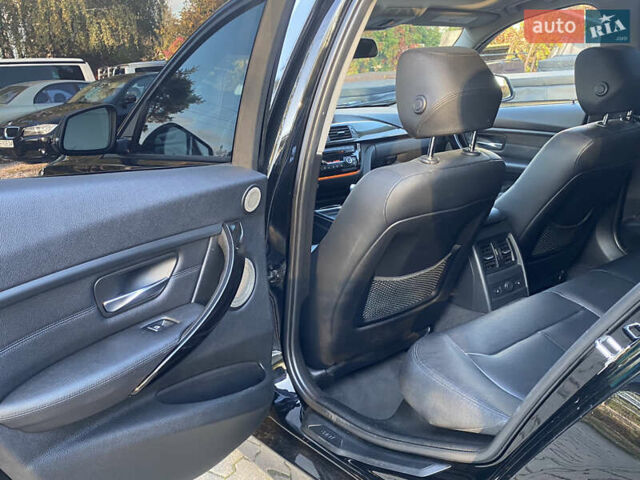 Чорний БМВ 3 Серія, об'ємом двигуна 2 л та пробігом 155 тис. км за 12999 $, фото 21 на Automoto.ua