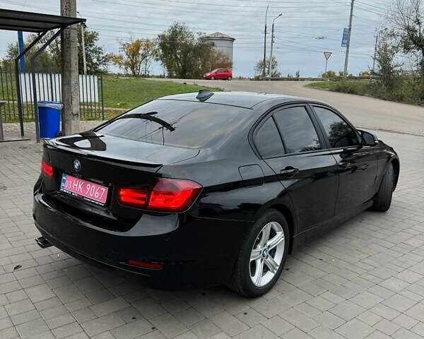 Черный БМВ 3 Серия, объемом двигателя 2 л и пробегом 165 тыс. км за 11800 $, фото 41 на Automoto.ua
