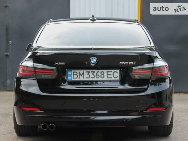 Чорний БМВ 3 Серія, об'ємом двигуна 2 л та пробігом 130 тис. км за 14430 $, фото 2 на Automoto.ua