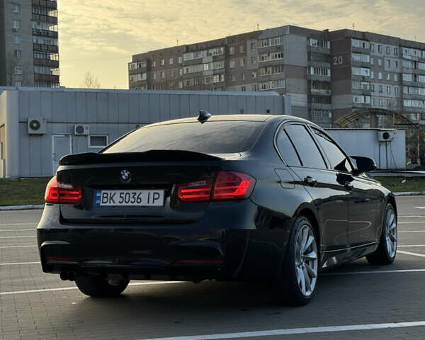 Чорний БМВ 3 Серія, об'ємом двигуна 2 л та пробігом 198 тис. км за 13800 $, фото 5 на Automoto.ua