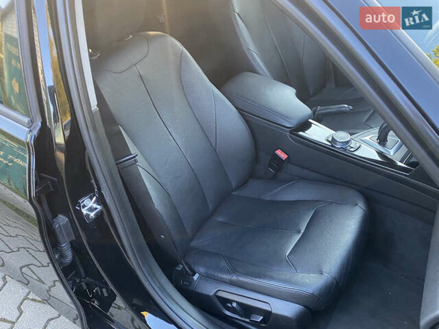Чорний БМВ 3 Серія, об'ємом двигуна 2 л та пробігом 155 тис. км за 12999 $, фото 28 на Automoto.ua