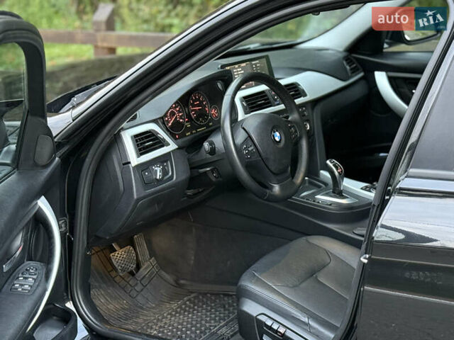 Чорний БМВ 3 Серія, об'ємом двигуна 2 л та пробігом 225 тис. км за 12999 $, фото 9 на Automoto.ua