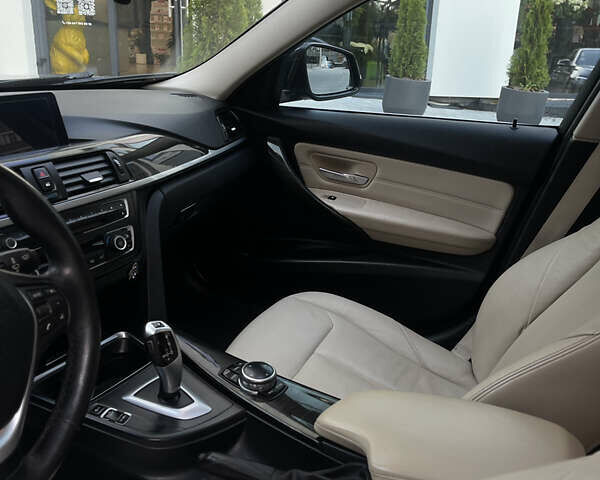 Чорний БМВ 3 Серія, об'ємом двигуна 2 л та пробігом 230 тис. км за 13800 $, фото 8 на Automoto.ua