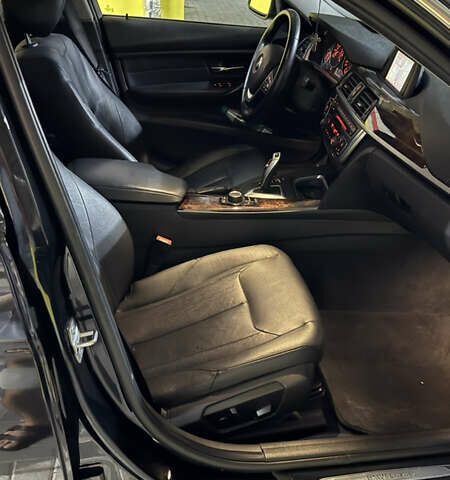 Чорний БМВ 3 Серія, об'ємом двигуна 2 л та пробігом 173 тис. км за 12500 $, фото 1 на Automoto.ua