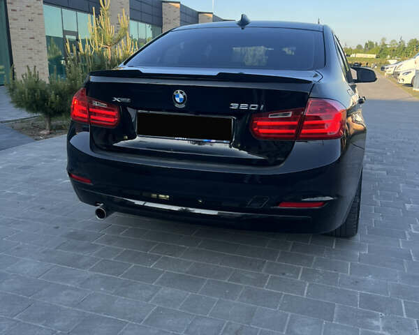 Черный БМВ 3 Серия, объемом двигателя 2 л и пробегом 210 тыс. км за 12499 $, фото 1 на Automoto.ua