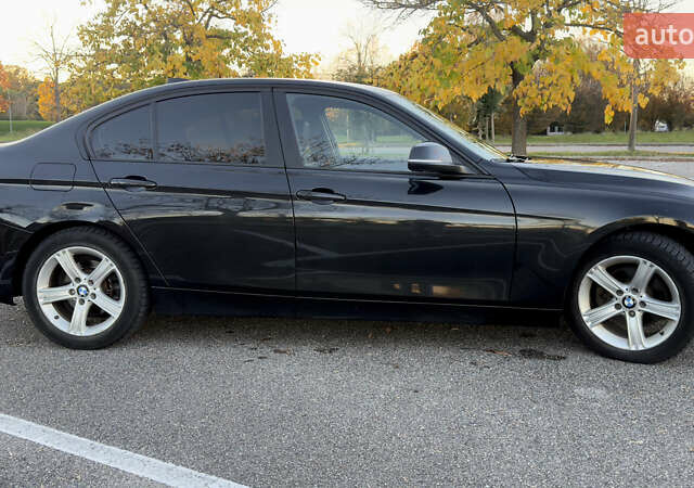 Черный БМВ 3 Серия, объемом двигателя 2 л и пробегом 190 тыс. км за 13700 $, фото 9 на Automoto.ua