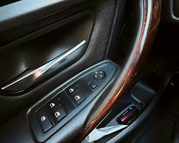 Черный БМВ 3 Серия, объемом двигателя 2 л и пробегом 210 тыс. км за 12499 $, фото 20 на Automoto.ua