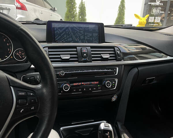 Чорний БМВ 3 Серія, об'ємом двигуна 2 л та пробігом 230 тис. км за 13800 $, фото 11 на Automoto.ua