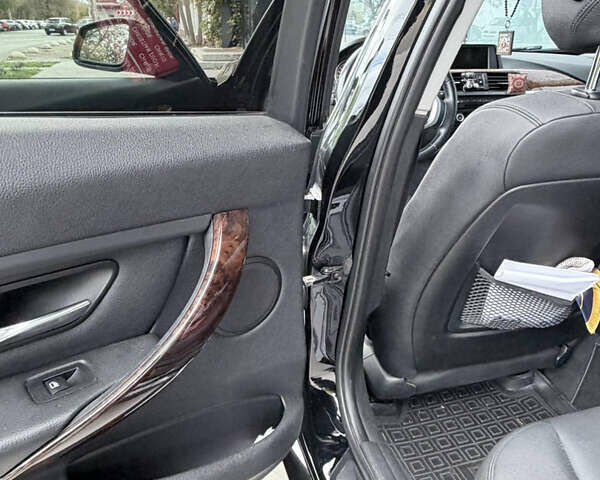 Чорний БМВ 3 Серія, об'ємом двигуна 2 л та пробігом 190 тис. км за 11500 $, фото 6 на Automoto.ua
