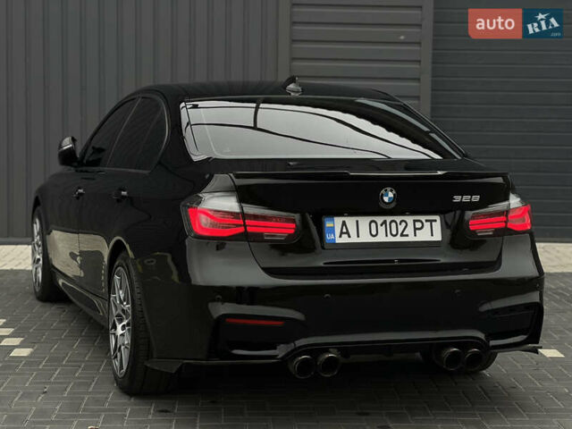 Черный БМВ 3 Серия, объемом двигателя 2 л и пробегом 207 тыс. км за 13599 $, фото 10 на Automoto.ua