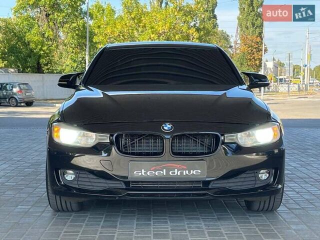 Черный БМВ 3 Серия, объемом двигателя 2 л и пробегом 179 тыс. км за 11499 $, фото 1 на Automoto.ua