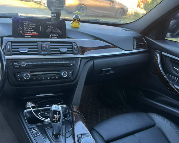 Черный БМВ 3 Серия, объемом двигателя 2 л и пробегом 210 тыс. км за 12499 $, фото 16 на Automoto.ua