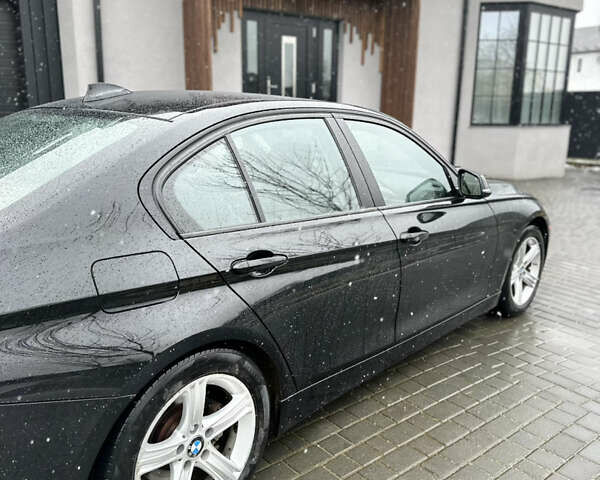 Чорний БМВ 3 Серія, об'ємом двигуна 2 л та пробігом 190 тис. км за 12000 $, фото 11 на Automoto.ua