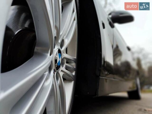 Черный БМВ 3 Серия, объемом двигателя 2 л и пробегом 162 тыс. км за 10990 $, фото 2 на Automoto.ua