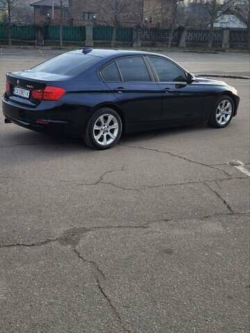 Черный БМВ 3 Серия, объемом двигателя 2 л и пробегом 210 тыс. км за 10800 $, фото 4 на Automoto.ua