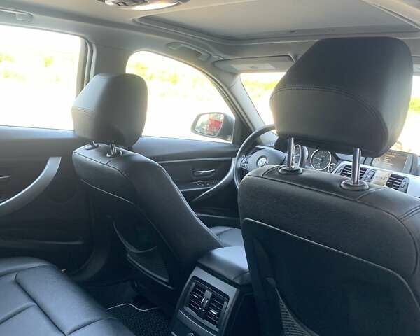 Черный БМВ 3 Серия, объемом двигателя 2 л и пробегом 170 тыс. км за 15500 $, фото 16 на Automoto.ua