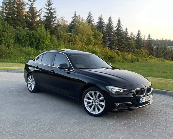 Чорний БМВ 3 Серія, об'ємом двигуна 2 л та пробігом 230 тис. км за 13800 $, фото 6 на Automoto.ua