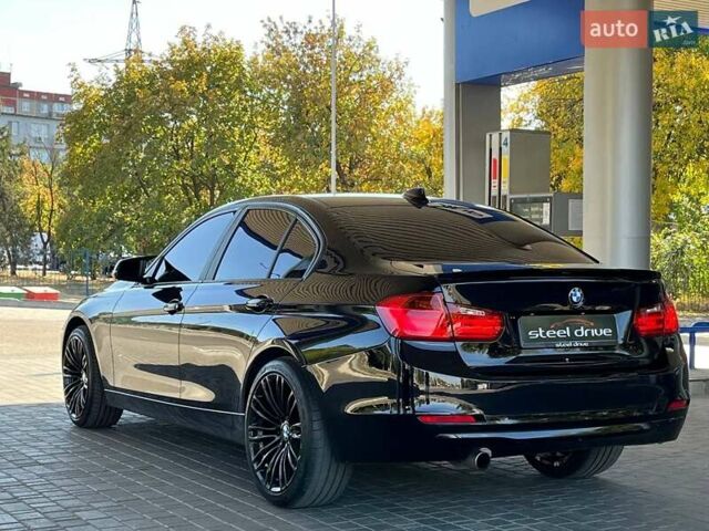 Черный БМВ 3 Серия, объемом двигателя 2 л и пробегом 179 тыс. км за 11499 $, фото 4 на Automoto.ua