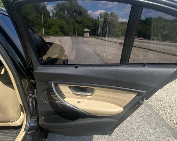 Чорний БМВ 3 Серія, об'ємом двигуна 2 л та пробігом 201 тис. км за 11300 $, фото 26 на Automoto.ua
