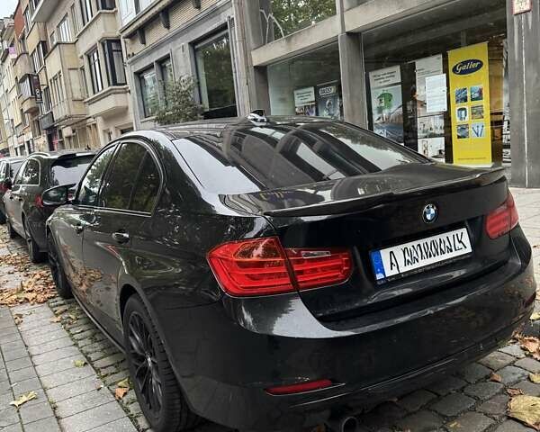 Черный БМВ 3 Серия, объемом двигателя 1.59 л и пробегом 200 тыс. км за 13887 $, фото 2 на Automoto.ua