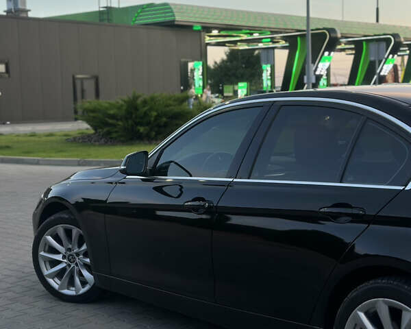 Чорний БМВ 3 Серія, об'ємом двигуна 2 л та пробігом 230 тис. км за 13800 $, фото 4 на Automoto.ua