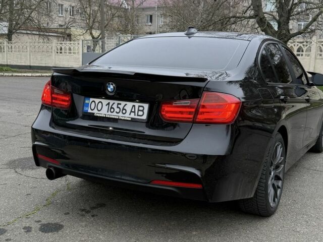 Чорний БМВ 3 Серія, об'ємом двигуна 2 л та пробігом 198 тис. км за 12700 $, фото 4 на Automoto.ua