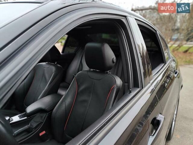 Черный БМВ 3 Серия, объемом двигателя 2 л и пробегом 162 тыс. км за 10990 $, фото 4 на Automoto.ua