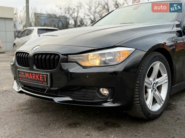 Чорний БМВ 3 Серія, об'ємом двигуна 2 л та пробігом 208 тис. км за 12500 $, фото 1 на Automoto.ua