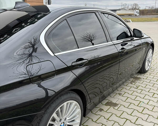 Черный БМВ 3 Серия, объемом двигателя 2 л и пробегом 110 тыс. км за 12000 $, фото 5 на Automoto.ua