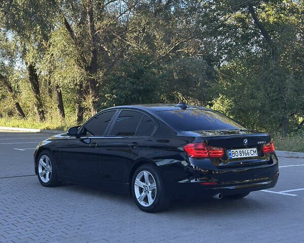 Чорний БМВ 3 Серія, об'ємом двигуна 2 л та пробігом 216 тис. км за 14500 $, фото 24 на Automoto.ua