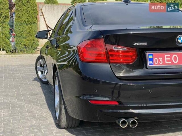 Чорний БМВ 3 Серія, об'ємом двигуна 2 л та пробігом 165 тис. км за 12500 $, фото 13 на Automoto.ua