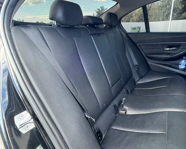 Черный БМВ 3 Серия, объемом двигателя 2 л и пробегом 210 тыс. км за 12699 $, фото 25 на Automoto.ua