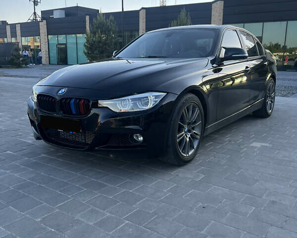 Черный БМВ 3 Серия, объемом двигателя 2 л и пробегом 210 тыс. км за 12499 $, фото 4 на Automoto.ua