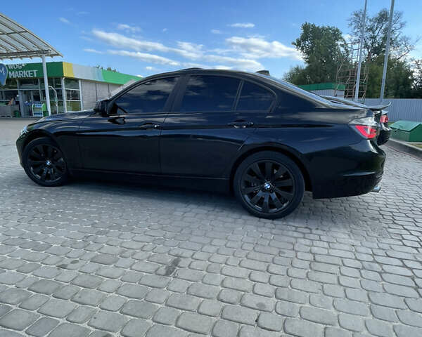 Черный БМВ 3 Серия, объемом двигателя 2 л и пробегом 210 тыс. км за 12699 $, фото 14 на Automoto.ua