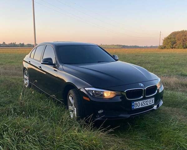 Черный БМВ 3 Серия, объемом двигателя 2 л и пробегом 162 тыс. км за 12900 $, фото 1 на Automoto.ua