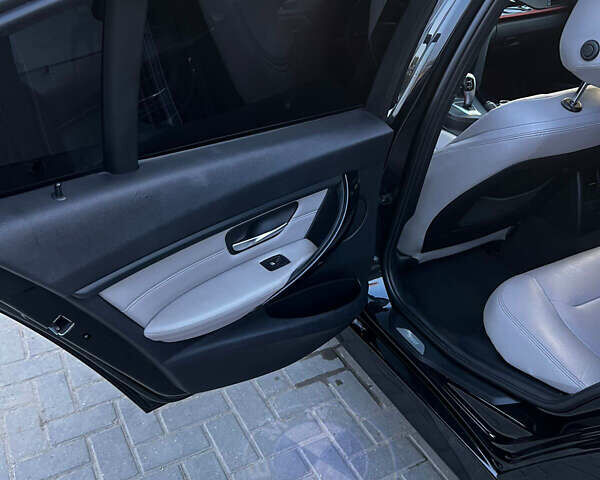 Чорний БМВ 3 Серія, об'ємом двигуна 2 л та пробігом 200 тис. км за 15500 $, фото 4 на Automoto.ua