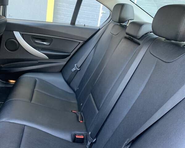 Черный БМВ 3 Серия, объемом двигателя 2 л и пробегом 170 тыс. км за 15500 $, фото 14 на Automoto.ua