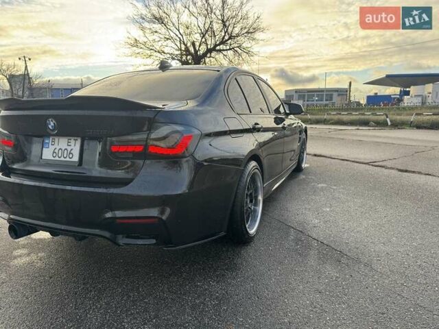 Чорний БМВ 3 Серія, об'ємом двигуна 2 л та пробігом 240 тис. км за 13800 $, фото 6 на Automoto.ua