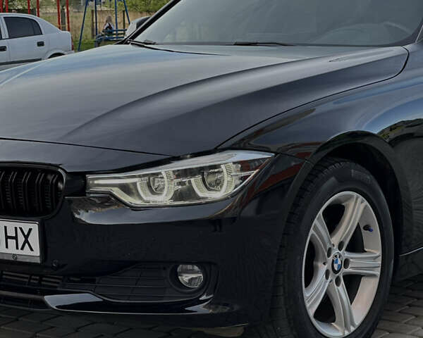 Черный БМВ 3 Серия, объемом двигателя 2 л и пробегом 154 тыс. км за 15999 $, фото 2 на Automoto.ua