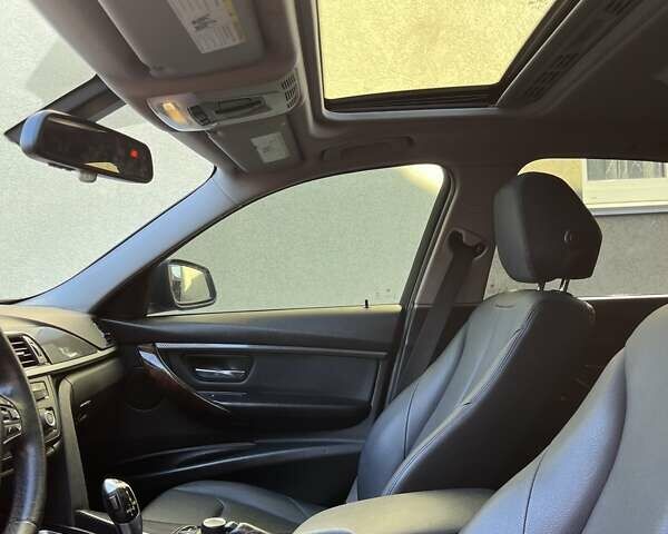 Черный БМВ 3 Серия, объемом двигателя 2 л и пробегом 185 тыс. км за 12700 $, фото 8 на Automoto.ua